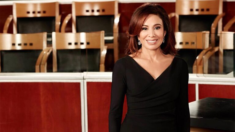Jeanine Pirro confidently walking through a government building in D.C.