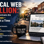 Laptop showing a local news website on a desk with a coffee mug and notebook, set against a small-town street backdrop, symbolizing independent local news and AI-driven publishing.